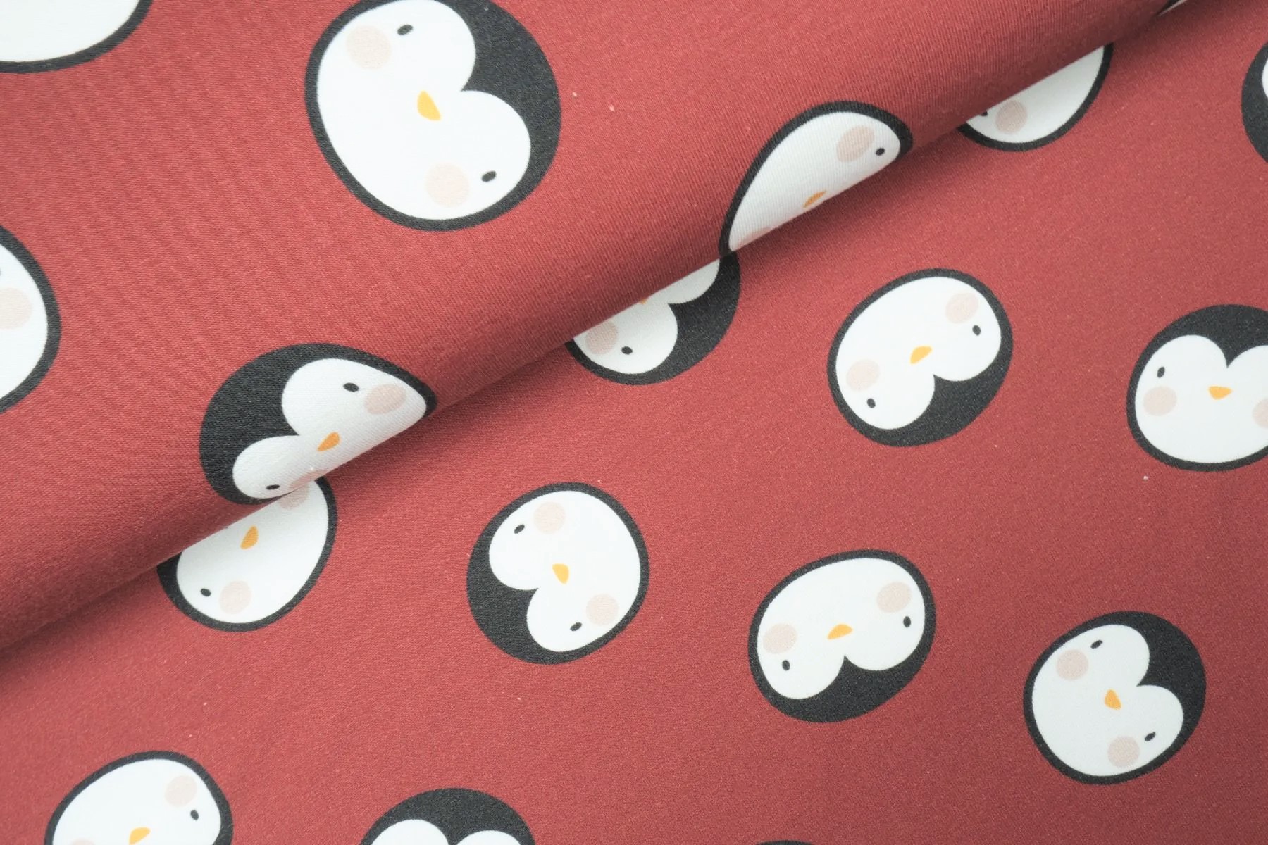 Sommersweat angeraut Digitaldruck mit Pinguinen  - rost
