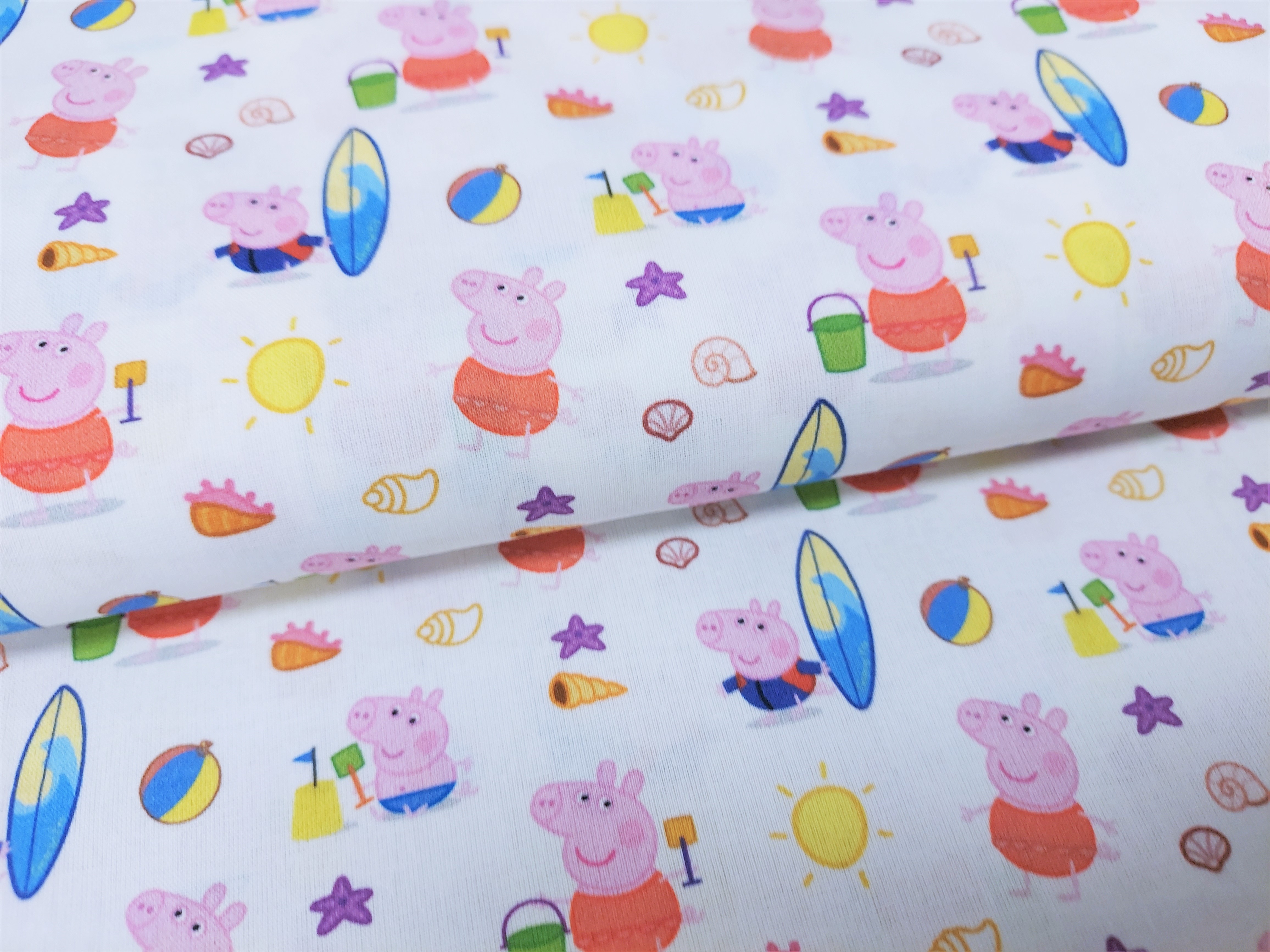 Baumwollstoff Lizenz mit Peppa Wutz am Strand, Digitaldruck - creme