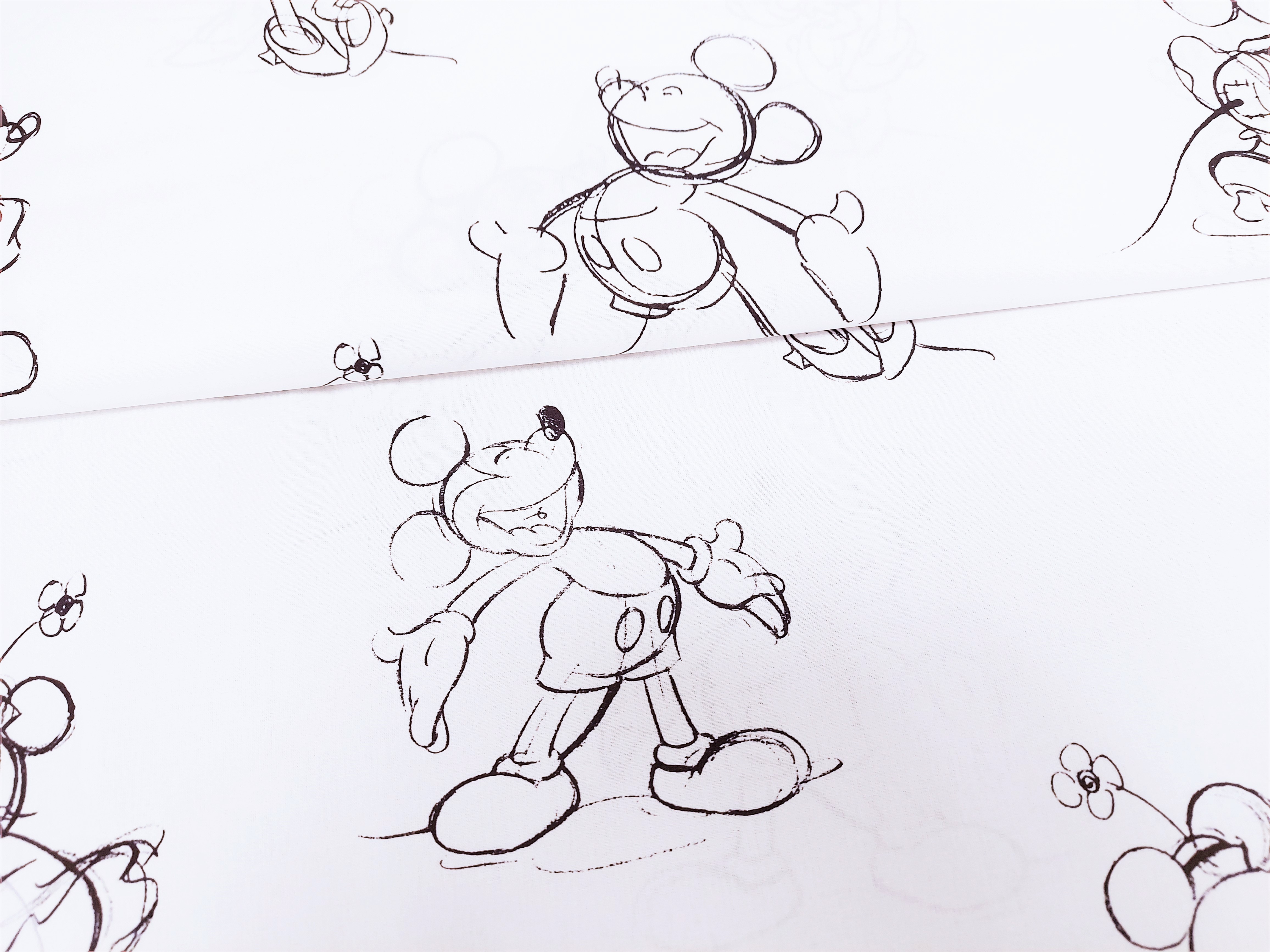 Baumwollstoff Lizenz mit Mickey und Minnie Maus - weiß/schwarz
