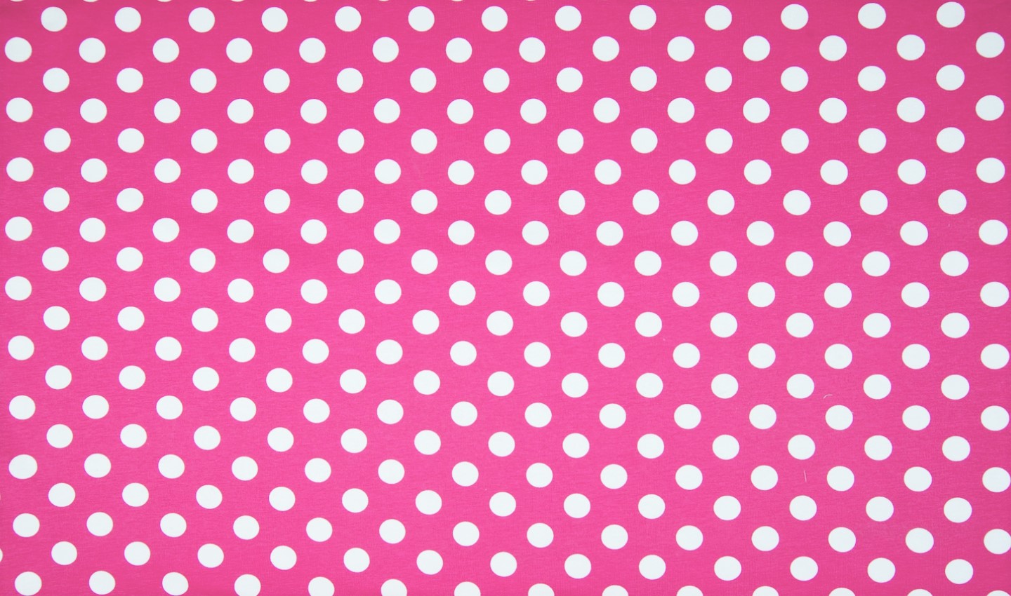 Baumwolljersey pink mit großen weißen Dots 